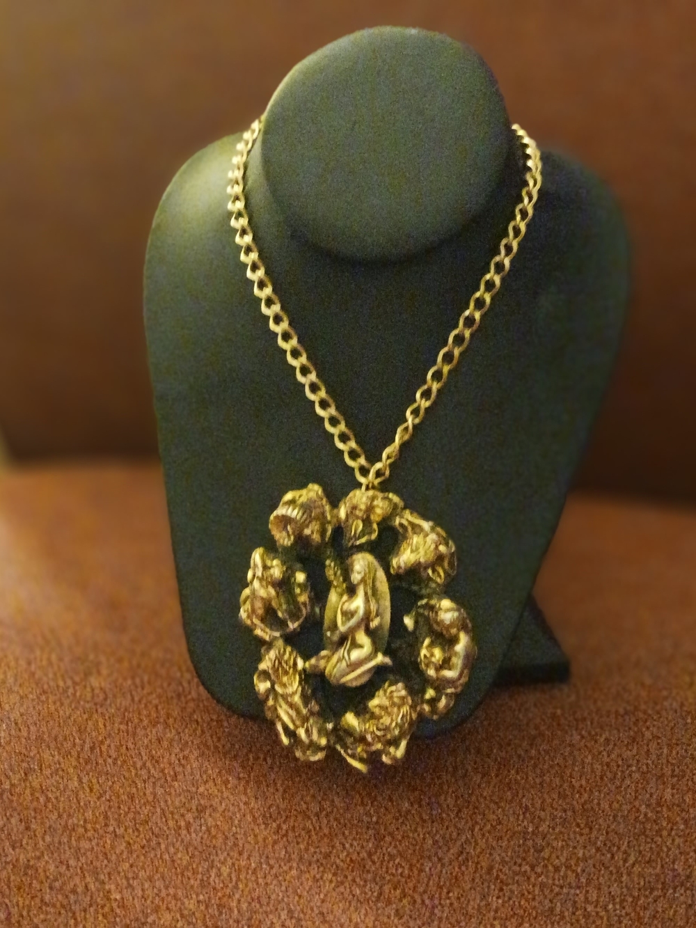 Gold Statement Pendant Necklace with Figurine